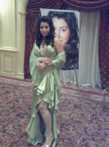 Ayten Amer wearing a green glam dress