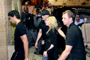 jesus Luz picture with his girlfriend madonna and security guards entering the Western Wall tunnel in Jerusalem during their visit to Tel Aviv Israel on August 31st 2009 5