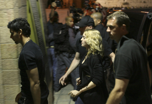 jesus Luz picture with his girlfriend madonna and security guards entering the Western Wall tunnel in Jerusalem during their visit to Tel Aviv Israel on August 31st 2009 3