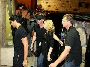 jesus Luz picture with his girlfriend madonna and security guards entering the Western Wall tunnel in Jerusalem during their visit to Tel Aviv Israel on August 31st 2009 2