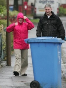 Susan Boyle photo spotted at Blackburn In The Rain wearing a red raincoat on August 18th 2009 2