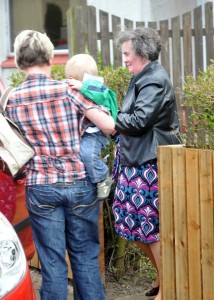 Susan Boyle candids in the Scottish village of Blackburn near her home wearing a patterened purple dress under a leather black jacket on April 21st 2009 1