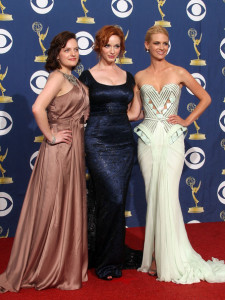 Elisabeth Moss with Christina Hendricks and January Jones at the 61st Primetime Emmy Awards