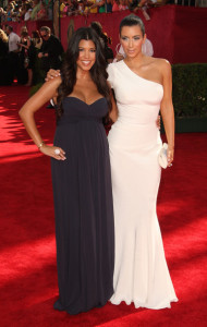 Kim Kardashian and Kourtney Kardashian arrive at the 61st Primetime Emmy Awards held at the Nokia Theatre on September 20th 2009 in Los Angeles