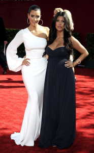 Kim Kardashian and Kourtney Kardashian arrive at the 61st Primetime Emmy Awards held at the Nokia Theatre on September 20th 2009 in Los Angeles