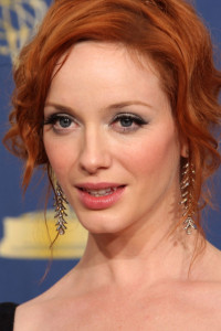 Christina Hendricks poses in the press room at the 61st Primetime Emmy Awards