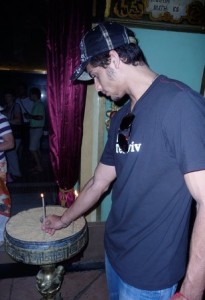 picture of Jesus Luz lighting a candle at the route of the Via Dolorosa in Jerusalem during his visit to Israel in August 2009