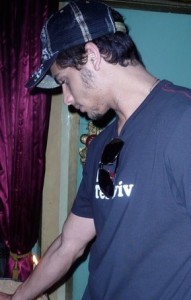 picture of Jesus Luz at the route of the Via Dolorosa in Jerusalem in August 2009 during his visit to Israel wearing a blue tel aviv imprint tshirt