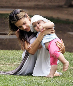 Alessandra Ambrosio picture as she is playing with her baby daughter Anja at the park