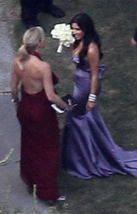 Kim Kardashian spotted at the wedding receptiopn of her sister Khloe wearing a backless purple dress as the bridesmaid at the brides residence in Beverly Hills on September 27th 2009 12