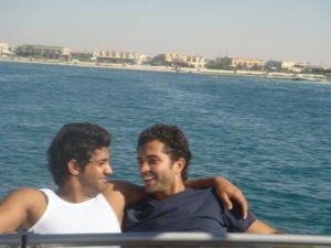 Summer Beach Photo of Ibrahim Dashi with Mohamad Bash on a boat in the middle of the sea