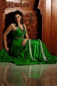 Hanaa Idrisi picture wearing some tranditional outfits as an advertisement 3