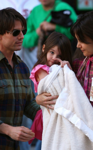 Tom Cruise and  Katie Holmes with thei daughter Suri spotted together for a walk in Boston Massachusetts on October 11th 2009 1