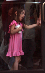 Suri Cruise spotted together with her parents for a walk in Boston Massachusetts on October 11th 2009 8