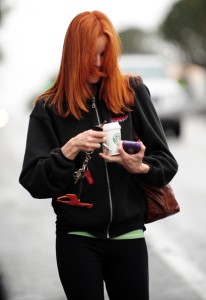 Marcia Cross spotted leaving a hairdresser holding a paper starbucks coffee cup in Santa Monica California on October 13th 2009 7