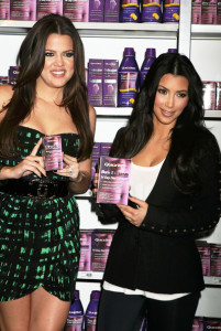 Khloe and Kim Kardashian introduce QuickTrim at the GNC store at the Beverly Center on October 15th 2009 in West Hollywood California 5