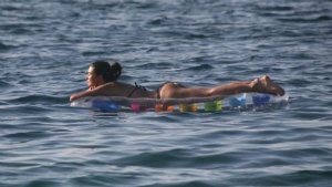 Tuba Buyukustun spotted swimming in the sea and hanging at the beach wearing a bikini 5