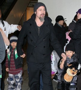 Brad Pitt spotted with his sons Maddox and Pax together at a video game hangout Dave and Busters in Times Square on December 30th 2009 3