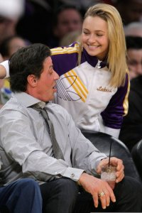 Hayden Panettiere meets actor Sylvester Stallone while she attends a Lakers Game in Los Angeles on December 25th 2009 3