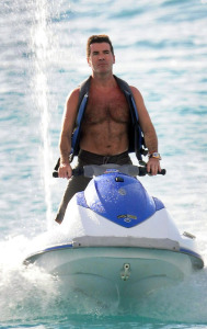 Simon Cowell  spotted enjoying his vacation on the beach in Barbados on December 25th 2008 where he also rode a jet ski