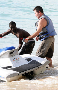 Simon Cowell  spotted enjoying his vacation on the beach in Barbados on December 25th 2008 where he also took a jet ski ride