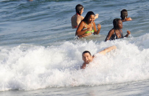 Hugh Jackman spotted swimming at the beach with his kids in Brazil on January 12th 2010 2