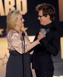 Meryl Streep presents an award to actor Kevin Bacon onstage during the 15th annual Critics Choice Movie Awards on January 15th 2010 at the Hollywood Palladium 3