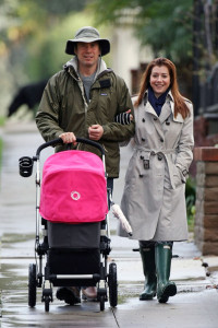 Alyson Hannigan and husband Alexis Denisof spotted together on January 19th 2010 walking with their baby daughter under the rain 7