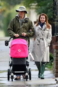 Alyson Hannigan and husband Alexis Denisof spotted together on January 19th 2010 walking with their baby daughter under the rain 4