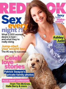 Ashley Judd shows off her gorgeous smile on the February 2010 cover of Redbook magazine with a cute puppy on the cover