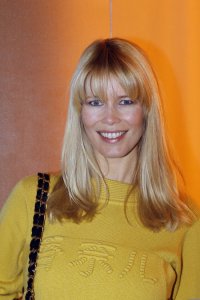 Claudia Schiffer spotted wearing a woolen yellow dress on January 26th 2010 while arriving at a Chanel Haute Couture Fashion show in Paris 4