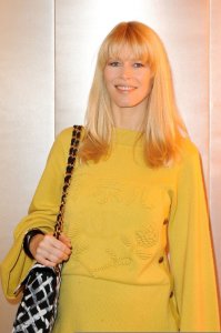 Claudia Schiffer spotted wearing a woolen yellow dress on January 26th 2010 while arriving at a Chanel Haute Couture Fashion show in Paris 1