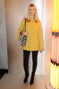 Claudia Schiffer spotted wearing a woolen yellow dress on January 26th 2010 while arriving at a Chanel Haute Couture Fashion show in Paris 2