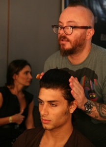 Jesus Luz doing hair and makeup backstage on January 19th 2010 at the Ellus runway show during the Sao Paulo Fashion Week in Brazil 11