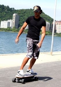 Jesus Luz spotted wearing a black tshirt and a funky head cap while skateboarding on Friday January 29th 2010 on the streets of Lagoa Rodrigo de Freitas 3