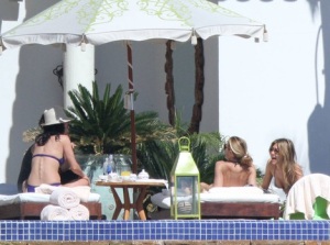 Courteney Cox with Jennifer Aniston spotted at the pool side with friends during Jens 41st birthday on February 5th 2010 in Cabo San Lucas Mexico 1