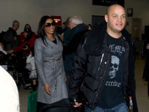 Melanie Brown and her husband Stephen Belafonte seen together on February 7th 2010 as they arrive at Los Angeles International Airport 5