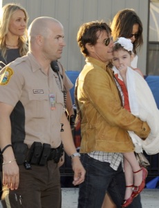 Cameon Diaz seen walking beside Tom Cruise and his wife Katie Holmes and daughter Suri at the Super Bowl on February 7th 2010 at the Sun Life Stadium in Miami Florida 2