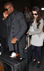 Kim Kardashian and Reggie Bush spotted at McCarron International Airport on February 13th 2010 in Las Vegas Nevada 1