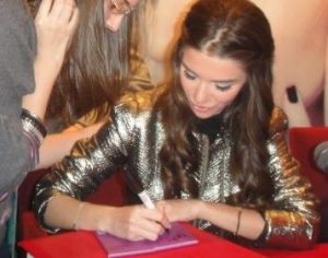 Lara Scandar at her CD release Mission is You held on February 3rd 2010 at Virgin Mega Stores in Cairo Egypt while signing autograhs for her fans 9