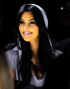 Kim Kardashian spotted at the Bebe Fall fashion show on February 16th 2010 wearing a gray short dress 7