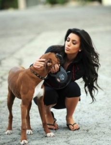 Kim Kardashian seen walking her dog Rocky on February 23rd 2010 wearing a red top under a black sport wear 2