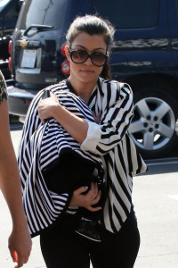 Kourtney Kardashian spotted carrying her new born baby Mason Dash Disick as she went shopping on February 25th 2010 at Fred Segal in West Hollywood 1