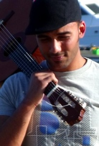 photo of Mohamad Ali Maghrabi from Egypt before star academy with his guitar