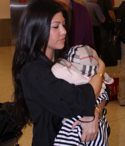 Kourtney Kardashian seen on March 2nd 2010 as she was arriving with her new born baby  at the Miami International Airport 1