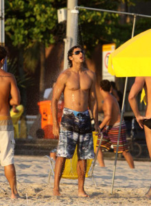 Jesus Luz spotted at the beach of Ipanema on February 2nd 2010 while wearing a patterned swim shorts and having a shower