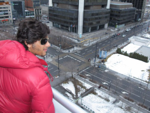 Jesus Luz photo from his visit to Montreal Canada on February 26th 2010 wearing a maroon rain jacket 2