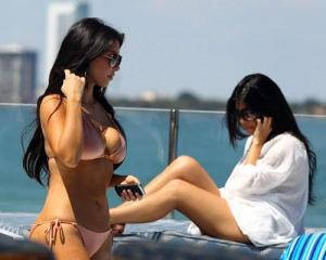 Kim Kardashian and Kourtney Kardashian spotted relaxing and sun bathing on a yakht on March 20th 2010 in Miami Florida 2