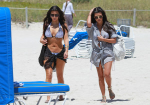 Kim Kardashian and Kourtney Kardashian spotted on March 30th 2010 as they film some scenes for their show Keeping Up with the Kardashians in bikinis on the beach 4