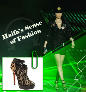 haifa Wehbe fashion diva photo while on stage singing at star academy seven prime wearing a glittery black skirt and jacket